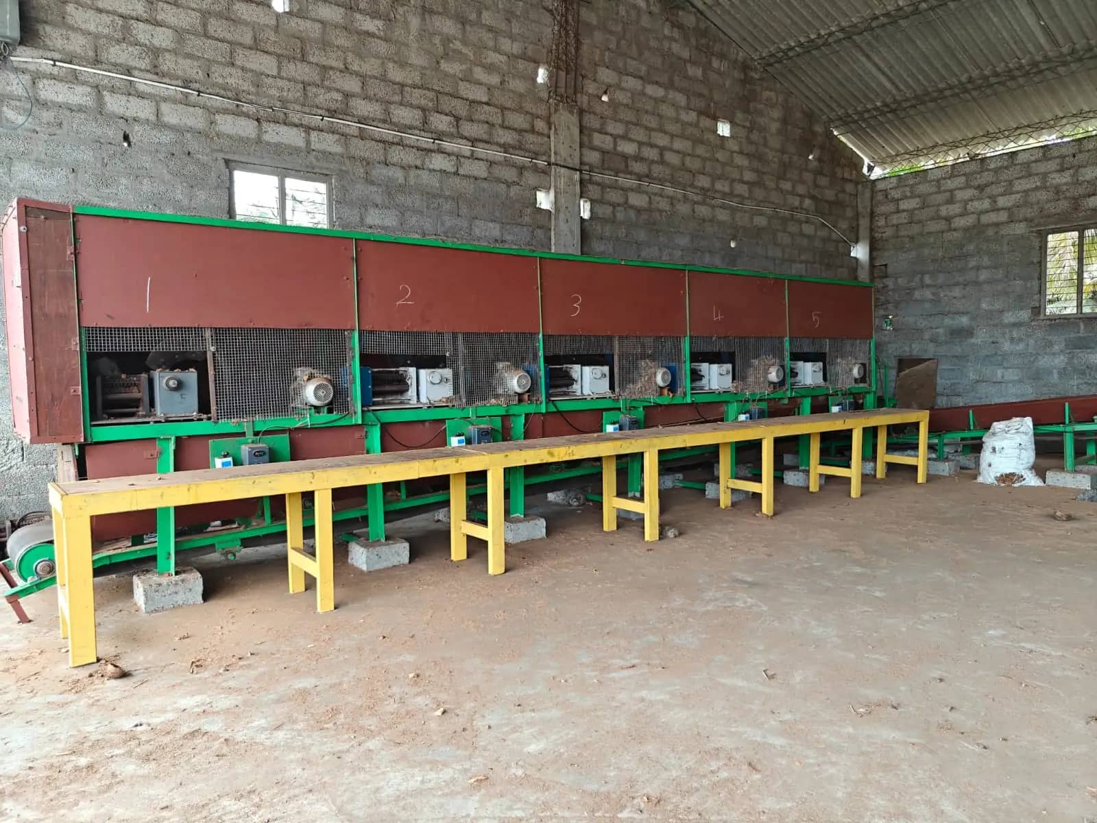 Hexagro machinery processing coconut husks into structured chips